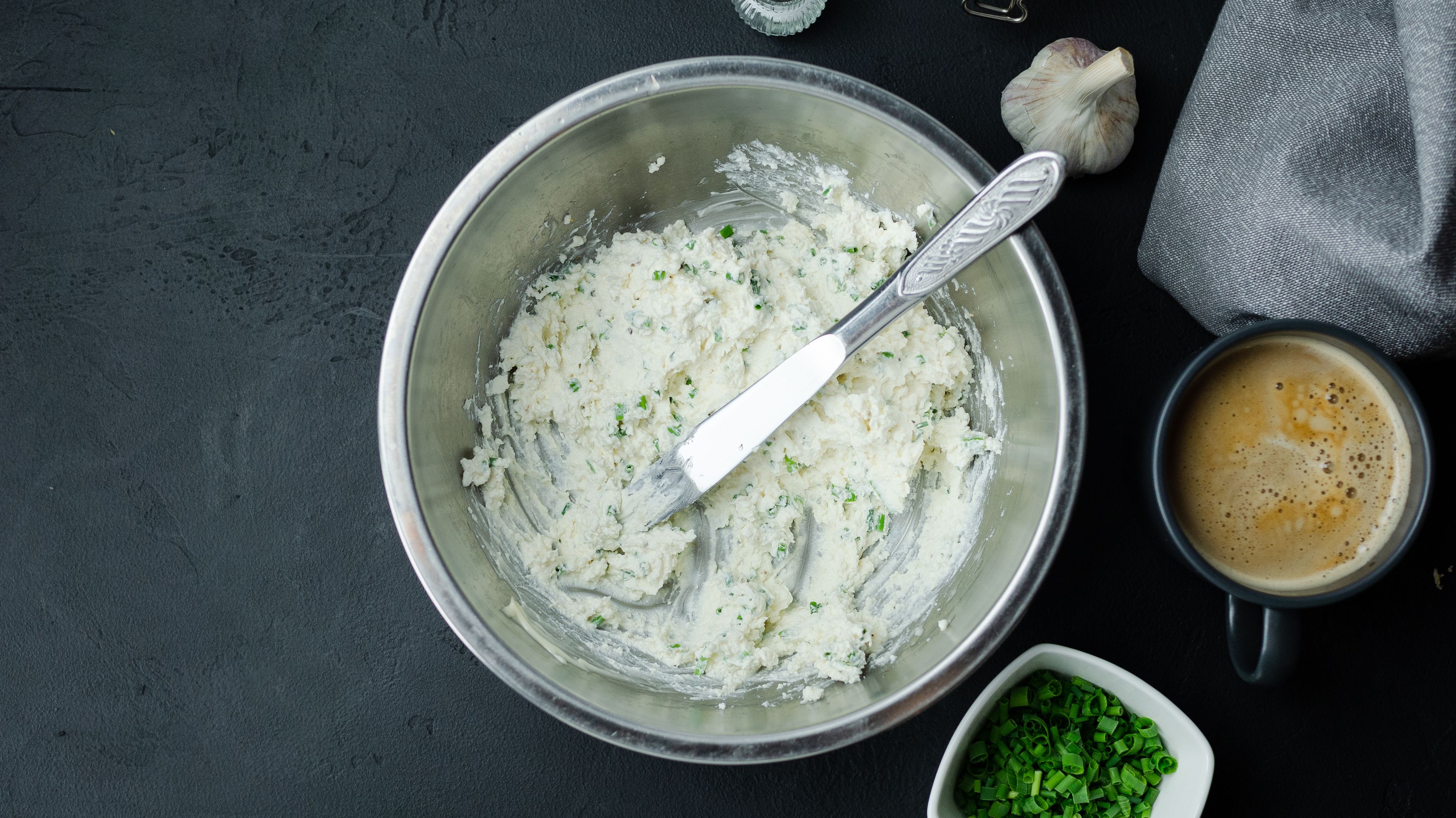 A bowl of fresh cheese whipped with herbs and garlic, Lyon style