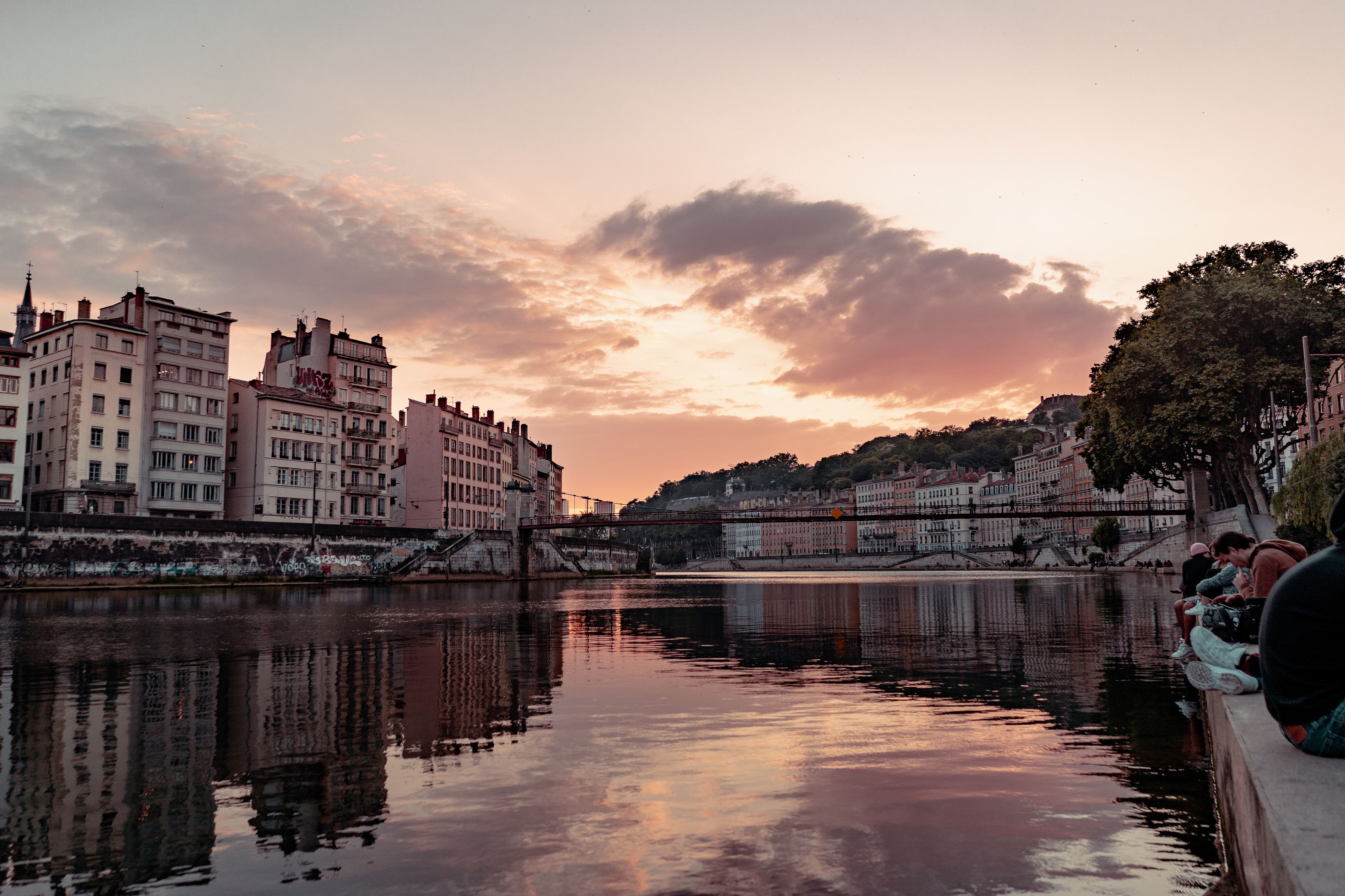 The Saint-Vincent footbridge over the Saône river in Lyon at dusk