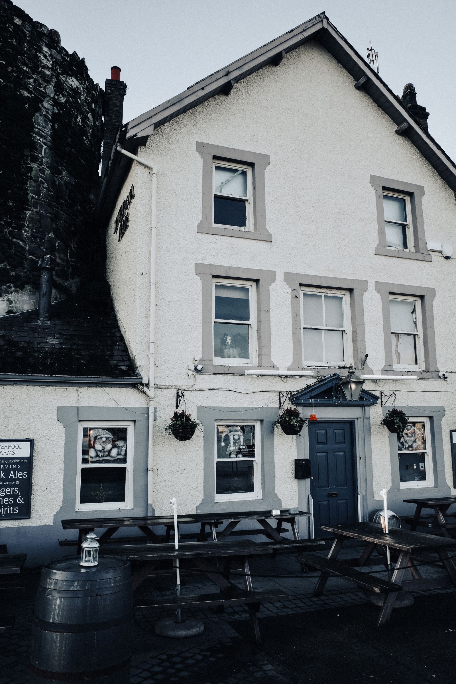 A traditional pub exterior on a high street in Conwy, Wales