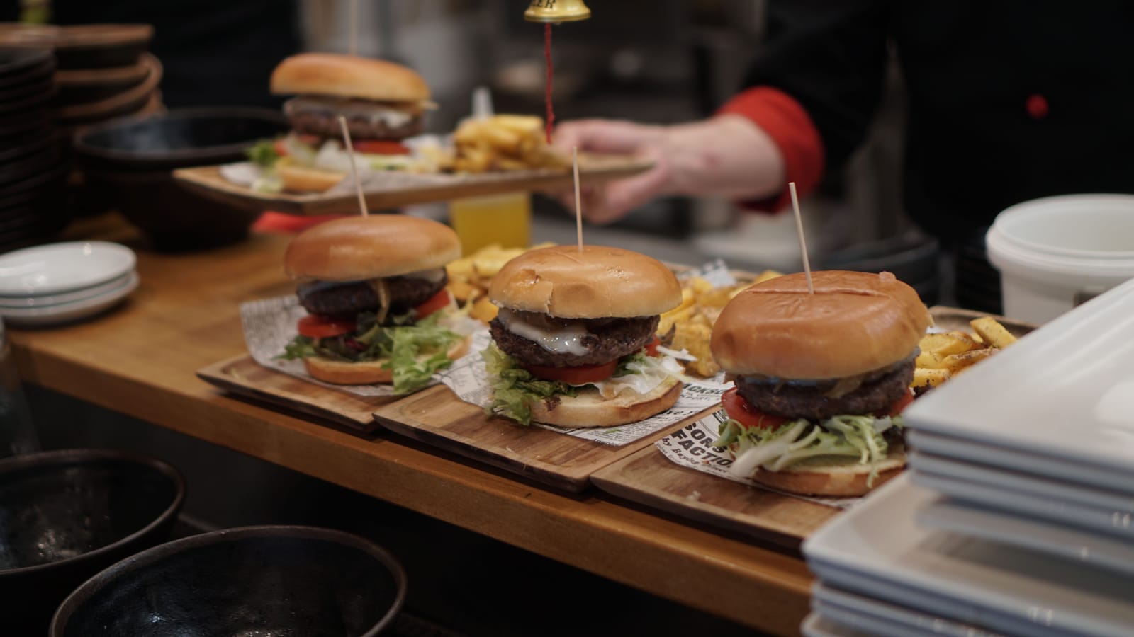 Burgers plated and ready for service in a casual American restaurant